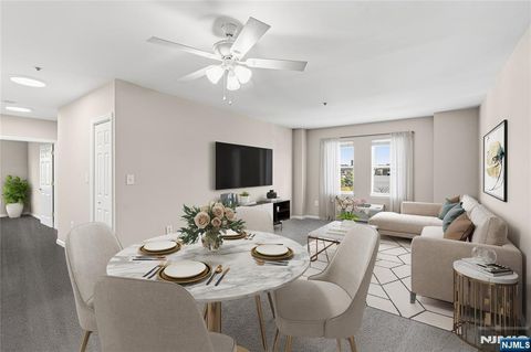 Photo of 905 River Rd #317, Edgewater, NJ 07020 (MLS # 25039639)