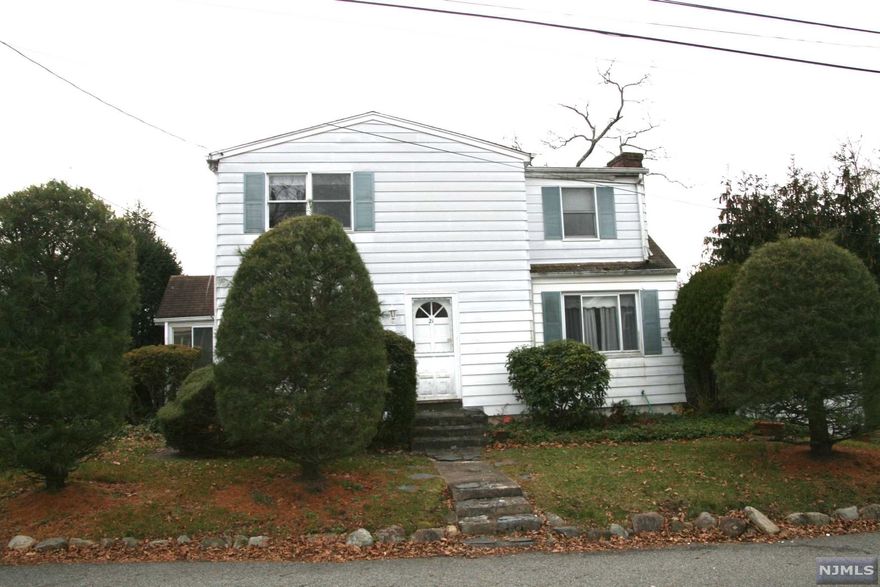 Calling all builders and renovators! This four bedroom 1.5 bath home is an ideal renovation candidate! Set on a beauty .229 Acre piece of property in a quiet neighborhood, this home is offers tremendous possibilities! Many of the surrounding homes have already been renovated and expanded. Home is to be sold in "as is" condition. Septic will need to be replaced.