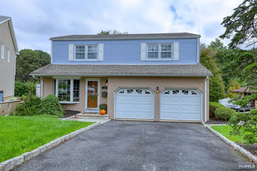 Welcome to 23 Coppola Ct in Clifton. Approximately 2000 sqft of living space with recently renovated finished lower level is a must see! 1st floor offers LR with bay window, leads to FDR which opens to Custom designed Gourmet kitchen with high-end appliances. Bosch cooktop and dishwasher, GE profile double oven and French door Samsung refrigerator, custom wood cabinets and pantry for extra storage. Tiled floor with center Island & granite countertops. Family room or a man-cave which open up to the private backyard with sliding doors. 2nd floor offers 4 Bedrooms, MBR with "his" and "her" closet and attached Full Bath. The finished lower level provides extra space which is currently serving as an office and storage, can be used as a perfect media room or a play area. The outdoor space is a luxurious private backyard with in-ground pool, waterfall and stoned patio for complete entertainment. 2 car garage with additional parking space.