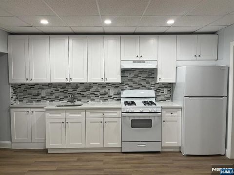 Photo of 226 Macarthur Ave, Garfield, NJ 07026 (MLS # 26010158)