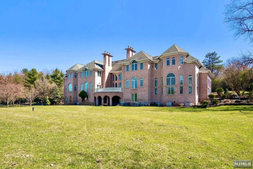 PRICED TO SELL! PALATIAL BRICK COLONIAL MANOR HOUSE WITH PANORAMIC SOUTH AND WEST VALLEY AND SUNSET VIEWS! TENNIS COURT! 10,104 SQ.FT. HOME ON FIRST TWO LEVELS PLUS FULL FINISHED LOWER LEVEL. INDOOR POOL ON MAIN LEVEL WITH SOARING CEILINGS. DRAMATIC ROTUNDA ENTRY FOYER. LARGE DINING ROOM, LIVING ROOM, AND LIBRARY. FAMILY ROOM ADJACENT TO KITCHEN. LARGE MASTER SUITE WITH INCREDIBLE VIEWS. THE LOWER LEVEL IS MOSTLY GRADE LEVEL ACCESS TO REAR YARD. LARGE FLAT BACKYARD. ONE OF THE HIGHEST POINTS IN ALPINE!