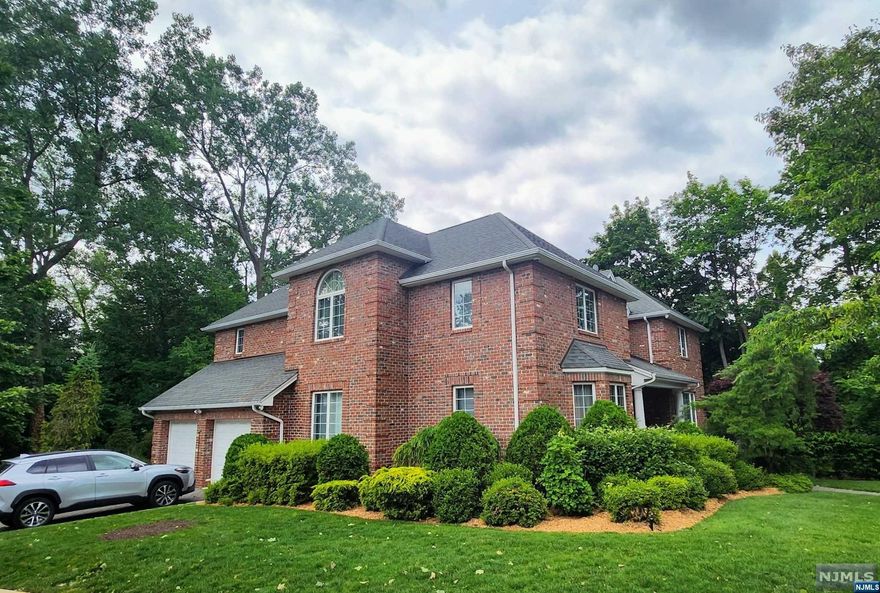 Welcome to this spacious and well-maintained family home in the heart of Englewood Cliffs! This beautiful 5-bedroom, 4-bath home is located in a quiet, family-friendly neighborhood close to schools, parks, and shopping. The home is about 10 minutes drive from New York City, making it a great option for commuters or anyone who loves the city life. The interior of the home is bright and airy, with large windows that let in plenty of natural light. The family room has a fireplace, perfect for relaxing or entertaining guests. The kitchen is open concept and has stainless steel appliances, granite countertops, and plenty of cabinet space. There are four bedrooms, including a master suite with its own fireplace and bathroom. All fixtures and furniture included in sale, including a $50,000 imported chandelier from Italy. This home is perfect for a growing family or anyone looking for a spacious and well-maintained home in a great location.