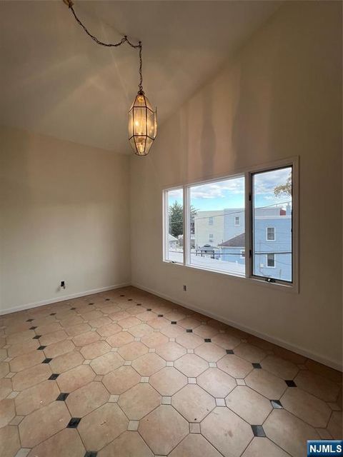 Photo of 54 Blauvelt Pl, Hackensack, NJ 07601 (MLS # 25038067)