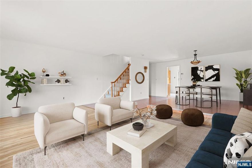 Welcome to this bright and spacious 3-story townhouse tucked within a private, well-kept complex. The home features 3 bedrooms, 2.5 baths, and a flexible bonus room ideal for a home office, gym, or guest space. The large eat-in kitchen opens to a comfortable living and dining area, perfect for everyday living and entertaining. Hardwood floors, abundant natural light, and an in-unit washer and dryer add to the homeâ€™s appeal. Enjoy your own private yard and a convenient location close to NYC transportation, shops, parks, and top-rated schools.