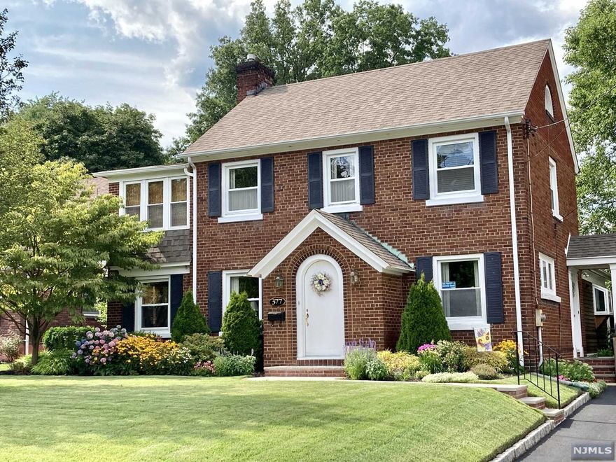WELCOME TO 377 HARRISOTWN ROAD IN THE POPULAR TOWN OF GLEN ROCK. TERRIFIC CURB APPEAL WITH THIS BRICK COLONIAL SITUATED ON PARK LIKE PROPERTY (170 DEEP) BEAUTIFULLY MAINTAINED HOME. FIRST FLOOR HAS ALL LARGE ROOMS: FORMAL LIVING ROOM WITH GAS FIREPLACE. OFF THE LIVING ROOM IS THE PERFECT SETTING FOR AN OFFICE. BANQUET SIZED DINING ROOM.AMAZING EAT IN KITCHEN, FULL BATH,FAMILY ROOM WITH OUTSIDE ENTRANCE TO THE BEAUTIFUL YARD. SECOND FLOOR HAS 3 BEDROOMS AND A SLEEPING PORCH, FULL BATH. BASEMENT IS HUGE AND FINISHED . 2 CAR DETACHED GARAGE WITH STORAGE. THIS HOME IS NOT TO BE MISSED.