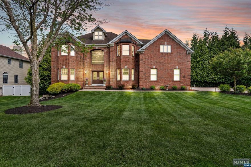 Pristine, elegantly appointed center hall colonial with so many amenities. Kitchen has three ovens (Viking), six burner stove top and a Sub-Zero refrigerator. Primary bedroom boasts a sitting room, spacious main area, dual walk in closets and a large bathroom with dual vanities, a soaking tub and stall shower. Third floor has a large sitting room suitable for a library, music or media room, gym or office. The property is professionally landscaped with a secluded in ground, saltwater, heated pool. Parking for four cars in paved driveway that is in tandem to a heated 2 car garage.