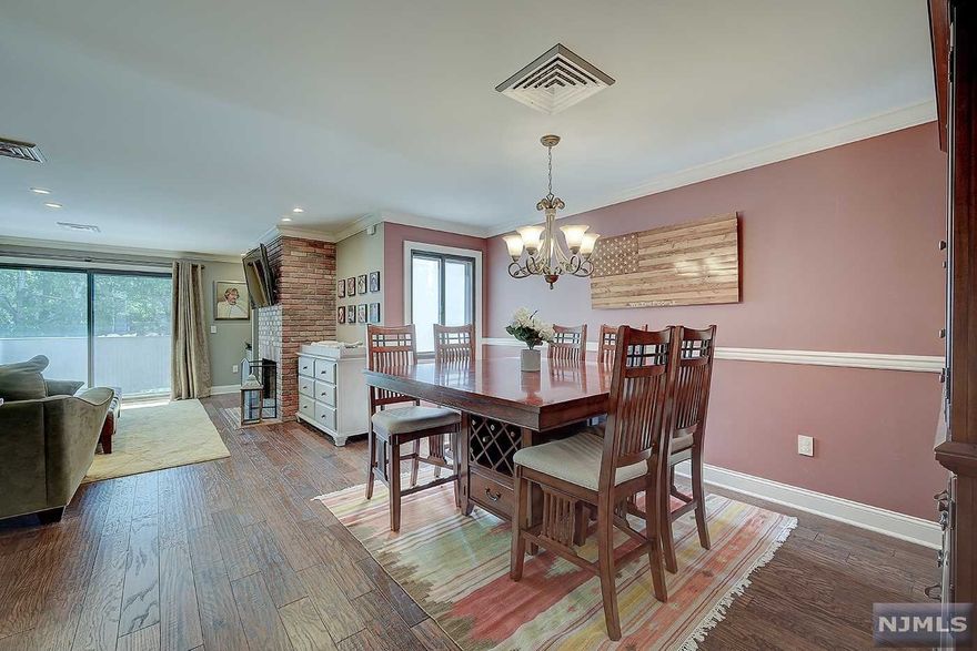 Beautiful, high end , renovated, multi floor unit in gated community. First floor boasts gourmet galley kitchen, stainless appliances and granite counter tops.Opens to spacious dining room, and wood burning fireplace. Sliders that leads out to deck. Large living room. Lots of crown molding and hardwood floors.Upper level has two large bedrooms, both have custom closets. Primary bedroom has wood burning fireplace and updated bath. Washer and dryer on second level. Very bright. Eagle Ridge is a gated community with many amenities, including indoor, outdoor pools, tennis and pickle ball courts and more. Fully equipped gym, basketball and yoga room too. Free jitney to train right in front and buses to NYC. Close to Zoo, Golf courses, restaurants, and shopping and so much more.