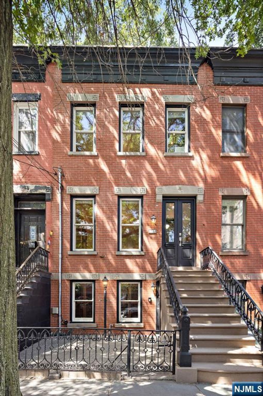 This 3 window wide, 17.5â€™ x 100â€™, uptown single family home has 4BD/3BA over 3 floors & a large basement. The home has been completely renovated and offers a large living/dining area and features a working gas fireplace w/ an original mantel, exposed brick, & a full bath. The renovated kitchen comes complete w/ plenty of storage, including a built-in buffet, pantry, and a working island with granite countertops complimenting the Bosch/Miele and Electrolux Icon appliances. The top floor has 3BD, primary w/ large walkâ€“in closet, full bath, and another 2BDs. The fully rebuilt staircase takes you to the garden level w/ another office/bedroom, full bathroom, and a large garden level family room which leads to a professionally landscaped backyard w/ large pergola & BBQ with dedicated gas line. 1314 Garden retains many original features including a beautifully restored façade and stoop, original double parlor floor doors, original mantels newel post, and many original decorative moldings. The home provides heating and cooling through a state-of-the-art 3 zones of forced air cooling and hot water radiators. The basement has storage, room for mechanicals, and features a custom wine cellar w/ tasting table. The 1300 block of Garden Street retains the highly desirable & consistent turn of the century townhouse architecture and is conveniently located near the 14th St NY Waterway Ferry, 14th & Washington Streets shopping, restaurants, and NJT bus route. Rental parking nearby.