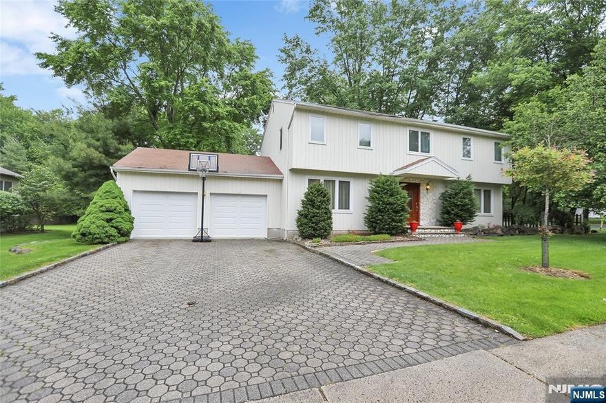 Immaculately maintained colonial house in desirable town of Closter. Hardwood throughout in 1st/2nd floor and updated kitchen and bathrooms when owners move into the house in 2015. Sizable FLR and family room with fireplace offer nice setting for entertainment. Fully finished basement with office room and recreation area. Close to parks, shopping and schools. Very bright house with Southern Exposure. All PHOTOS taken before current tenants move in.