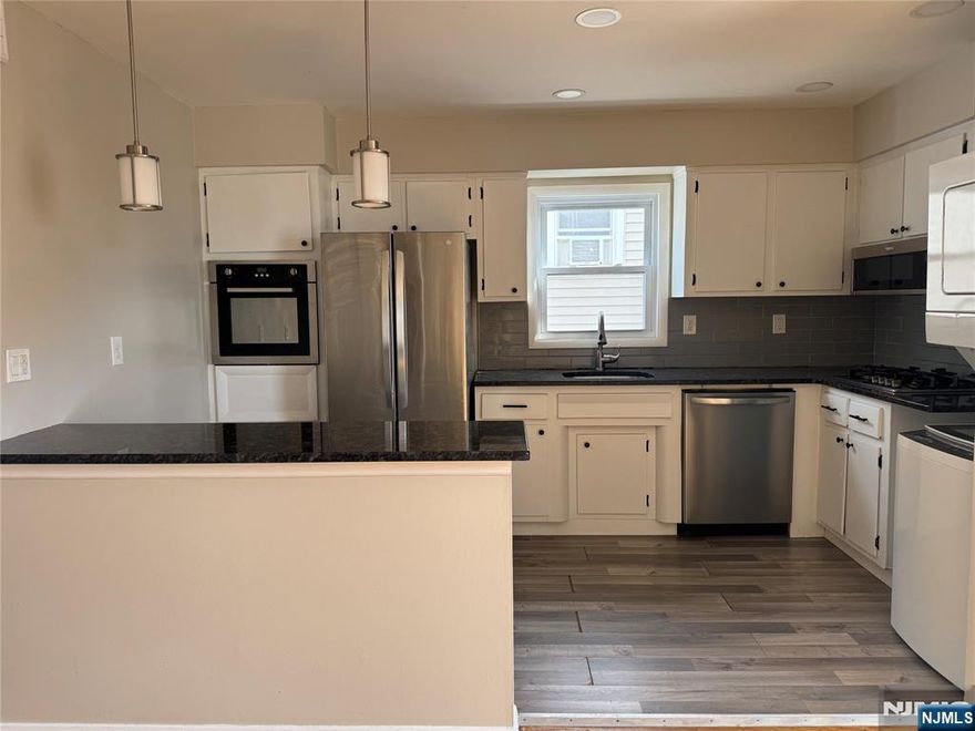 Welcome to this second floor apartment in Belleville NJ ! Kitchen, living, separate dining, 2 bedrooms & bath. Unit features hardwood flooring throughout, updated features which include kitchen and bathroom remodel. Kitchen appliances include: refrigerator, gas stove / oven, dishwasher, microwave & stackable washer/dryer. Bonus - LAUNDRY IN UNIT!! Spacious 2 bedrooms with great closet space. Hallway closet for additional storage. Large windows for natural lighting. Very close to Clara Mass Hospital and Branch Brook Park - known for their beautiful Cherry Blossom Trees! Conveniently located near food stores, shopping centers etc. Unit includes basement storage & 1 car driveway parking. Additional spots available for a fee. Use of yard is permitted. Baseboard heating. Window/ Wall AC units. Tenant pays gas / electric. Small pet may be considered. Available May! Don't miss out on this beautiful apartment!