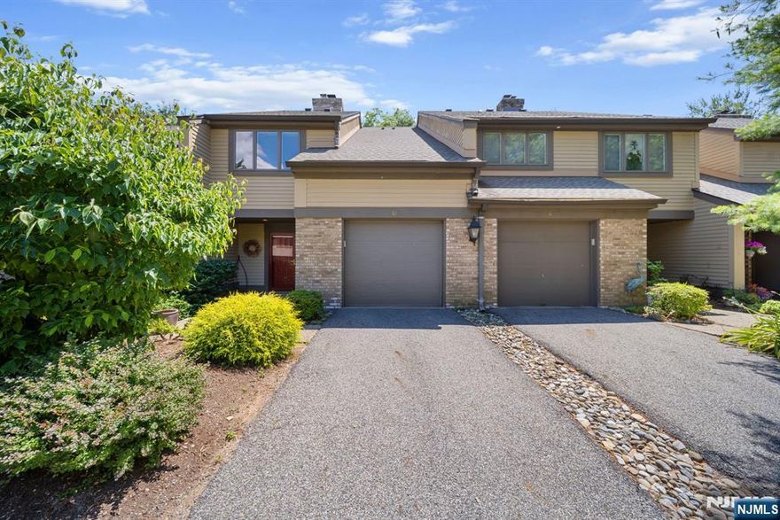 Discover Brookside Manor in the sought-after Fardale section of Mahwah. This pristine, newly renovated 2-bedroom, 2.5-bath luxury home offers over 1,855 sq ft of stylish living space, plus a partially finished lower level, making it one of the largest two-bedroom home in the community. If youâ€™re looking for a beautifully updated home that feels brand new, this is it. The open, sun-filled layout features gleaming hardwood floors and recessed lighting throughout. The expansive living/family rm is warm and inviting, highlighted by a wood-burning fireplc, with seamless flow to the dining areaâ€”ideal for entertaining. Sliding glass doors lead to a large deck, perfect for outdoor gatherings. The brand-new white eat-in kitchen showcases quartz countertops, decorative tile backsplash, stainless steel appliances, and stylish finishes, enhancing the open-concept design. Upstairs, the all-hardwd level offers two spacious bedrooms and a bonus loft overlooking the family room, ideal for a home office or flex space. The primary suite features a newly renovated bath, dressing area, and custom walk-in closet. A second large bedroom with double closets and a renovated full hall bath complete the level. The lower level provides a partially finished space ideal for a gym, recreation, or storage, plus in-unit laundry and an attached one-car garage. Community amenities include a clubhouse, pool, tennis & pickleball courts, walking paths, and snow removal. A rare opportunity not to be missed.