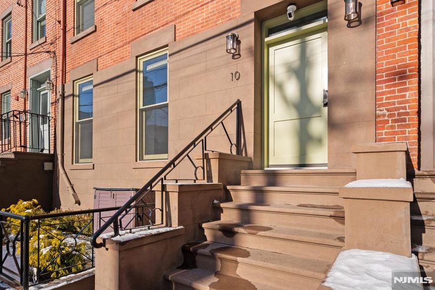 This stunning 2,000+ SF duplex condo perfectly combines modern design, functionality, and comfort in one of Jersey Cityâ€™s most desirable locationsâ€”just around the corner from the Grove Street PATH Train Station, making it a true commuterâ€™s dream. Featuring two private entrances, two full kitchens, and three luxurious full bathrooms, this home offers exceptional flexibility for entertaining, extended stays, or multi-generational living. The main kitchen is a showpiece, boasting a custom panel refrigerator, wine cooler, dishwasher, and a cleverly designed pantry with a hidden built-in microwave. Elegant finishes and a fully open layout make this residence perfect for gatherings with friends and family. The bathrooms are dressed in large-format Porcelanosa tiles, offering a spa-like ambiance throughout. With over 1,200 square feet of outdoor living space, including your own private deck and backyard oasis, youâ€™ll enjoy an effortless blend of indoor-outdoor livingâ€”ideal for relaxing or entertaining in style. The flexible layout includes three spacious bedrooms, multiple living areas, and the feel of two separate homes under one roofâ€”ideal for hosting guests or creating private spaces for work and leisure. A rental garage located just around the corner adds everyday convenience to this extraordinary home. From the impeccable finishes to the thoughtful design, every detail has been carefully curated for modern living. This property will steal your heart away!