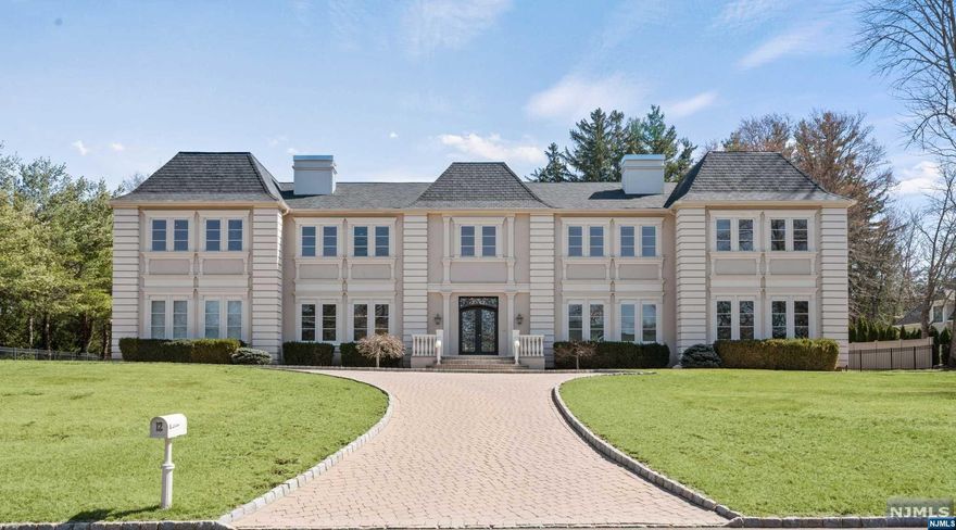 Custom-built 12000 sq ft estate on 3 purposeful levels. Stucco exterior & new 2021 CertainTeed roof. Grand entry w/ double-height foyer & great rm, creating expansive & open ambiance. Rest of main level features 11-ft ceilings. Salerno kitchen w/ maple cabinets, Sub-Zero R/F, 2 Miele DWs, Thermador Pro gas range, & 2 large islands. Dining room w/ gas fp, living room w/ gas fp, family room w/ wood-burning fp & library w/ gas fp & separate rear entrance. Upper-level w/ 9-ft ceilings and large laundry room. Master suite oasis w/ 2-sided gas fp shared w/ sitting rm, large en-suite bath & oversized closet. 4 addl spacious & bright BRs w/ 2 Jack&Jill baths. Basement w/ 12-seat theater, game rm, gym, wet bar & powder rm. Fenced-in backyard w/ gunite pool & Tennessee Sawn stone patio. Desirable location w/ access to top-rated public schools, shopping & easy commute to NYC. A perfect choice for discerning buyer. Rare opp to own a piece of USR's finest real estate.