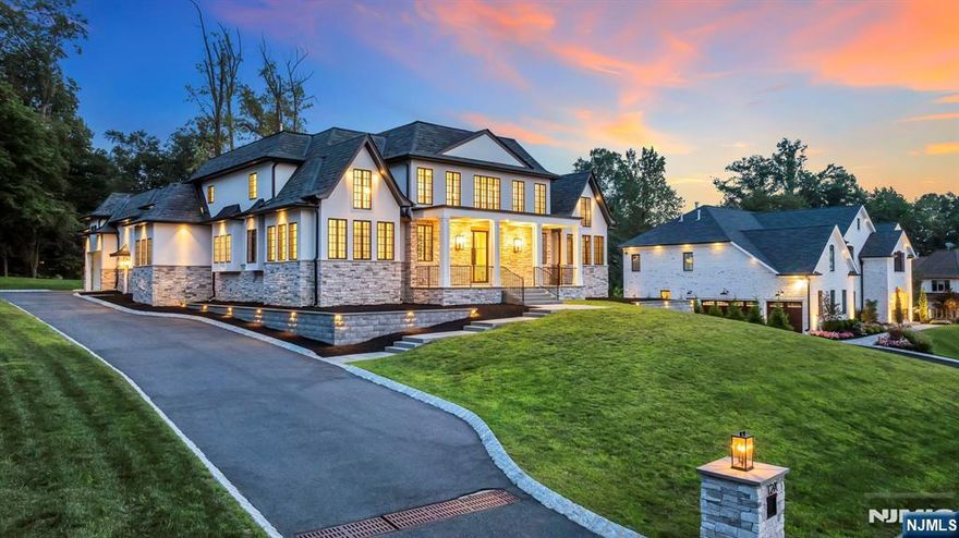 North Caldwellâ€™s Future Landmark - Presented by Christieâ€™s International Real Estate, this modern chateau stands poised to set a new standard in town. Perched on a coveted hilltop, its commanding black-and-white facade, sculptural rooflines, and impeccable symmetry evoke both European grandeur and cutting-edge design. Created by Liggero Architecture and crafted with only the finest materials, the home is a study in refined drama. Through double iron-and-glass doors, soaring ceilings and walls of glass frame sweeping western views. The great room, anchored by a sleek fireplace and statement bar, flows effortlessly into a chefâ€™s kitchen where Shiloh cabinetry, thick-edge granite, and Wolf & Sub-Zero appliances create a space both functional and showstopping. A butlerâ€™s pantry and hidden scullery cater to grand entertaining. The main-level primary suite is a private retreat with vaulted ceilings, two Italian-built closets, and a spa-inspired bath with White Volcanic Stone tub, walk-in shower, and private patio with fireplace. Upstairs, generous bedroom suites offer balconies, vaulted ceilings, and even hidden rooms. The 3,500 sq. ft. lower level is primed for a theater, game lounge, luxury bar, or au pair suite. With approved plans for a resort-style pool and outdoor kitchen, plus a 900 sq. ft., 3-car garage with lift-ready ceilings, this property offers both prestige and possibility. An address of distinctionâ€”designed for those who expect nothing less than extraordina