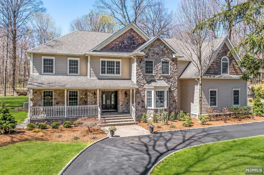 Move right in to this truly magnificent home w/custom millwork, high ceilings & luxury finishes throughout. 5 bed, 5 full bath, 3.5 car garage & no detail overlooked. The grand entryway opens up to an expansive 1st floor that includes a formal living room, dining room w/inlay floors, newly renovated eat-in kitchen w/high end appliances, walk-in pantry/mudroom, two-story great room w/stone fireplace & bedroom w/attached bath. The back windows overlook the private, fully-fenced yard & patio w/landscape lighting. The front & back staircases lead to the 2nd floor, which boasts 10 ft. ceilings, 3 bedrooms, 2 w/adjoining baths & 1 w/attached bath, a laundry room & oversized primary suite w/ walk-in closet, sitting area, fireplace and elegant bathroom w/jacuzzi. All closets are custom designed. The basement is an entertainer's dream w/a lounge area, custom-built wine cellar, game room, gym & full bath! With new carpeting & fresh paint throughout, this home is ready to be enjoyed!