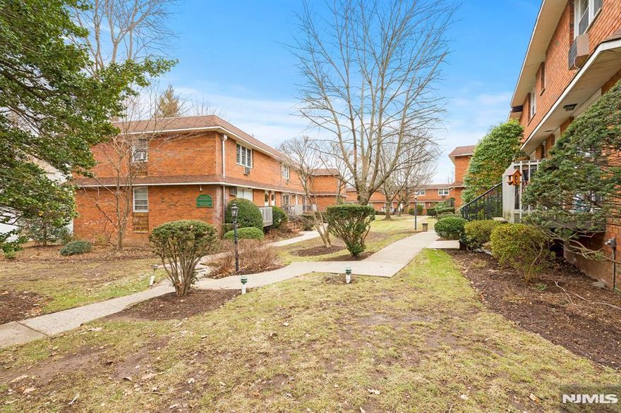 Welcome to this inviting, freshly painted one-bedroom, one bath condo in a terrific Montclair neighborhood. The bright, open-concept living and dining area offers a comfortable, functional layout.. A streamlined galley kitchen with stainless fridge, stove & MW makes excellent use of space and connects seamlessly to the main living area for easy everyday living and entertaining.The spacious bedroom features double closets for ample storage and opens to a private balcony overlooking quiet green space. Additional highlights include hardwood floors, one dedicated garage parking space, convenient on-site laundry, and a pet-friendly community for cats (no dogs). This home is a wonderful opportunity for a buyer wanting a low-maintenance lifestyle located close to downtown Montclair's shops, restaurants, and convenient bus & train transit options.