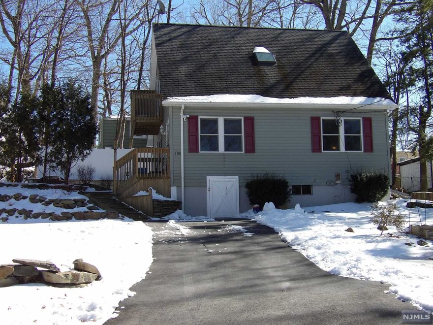 This lovely home was rebuilt and reframed from the first floor up! All new in 2012 new walls, windows, doors, kitchen, bathrooms, roof, framing, electric, plumbing, septic, Large eat in kitchen with lovely cabinetry! Great wood burning stove in the formal din rm, powder rm and office on 1st flr. The 2nd floor has two good size bedrooms both w/double closets, master has walkout balcony, laundry center, bathroom w/double sinks, computer rm, pull down attic stairs to large attic storage area! Outdoors you will find a paver patio, hot tub w/gazebo, Recent improvements: new heating system, 150 amp service, hot tub w/roof, new fencing, blacktop drive, well pump and tank.The owner purchased and is including an extra lot in the sale! Close to Upper Greenwood Lake, boat launch, clubhouse and beach area. Minutes away from lovely Warwick NY with its restaurants, vineyards, apple picking, Waywayanda state park, Golf Courses, Ski Area's!!!