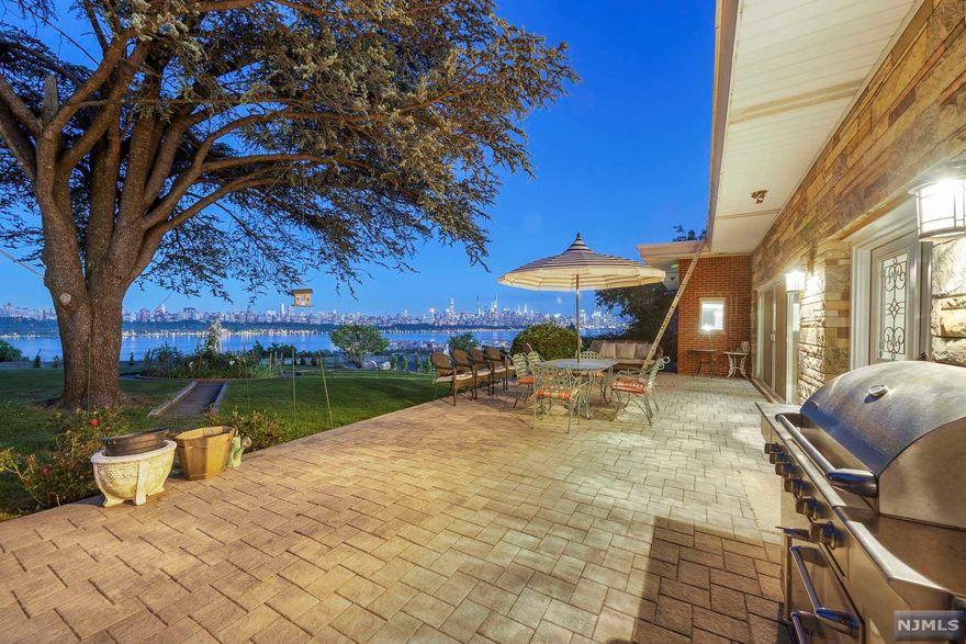 Unique opportunity to own one of the largest remaining residential lots with Manhattan and Hudson River views.Fully Renovated Ranch. New Hardwood floors with custom inlays, Living Room with Fireplace and floor to ceiling views of Manhattan. Chef's kitchen with island - top of the line appliances. 30,000+ sf lot plus an attached garage.Ground Floor features additional bedroom, large family room with another fireplace and bar, full bathroom, plenty of storage space.Own a piece of the Palisades! The VIRTUAL TOUR link for this listing contains a comprehensive video tour with hidden features & room dimensions and a complete interactive 3D model of the home.