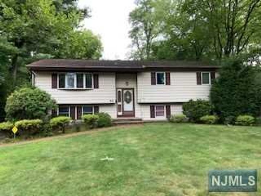 Spacious Bi-Level situated on the East Hill of Demarest.Facing south. Quiet Cul-de-sac area. This property was built in 1965 as the builder's own residency. Three (3) zone heating and central air conditioning system. Updated 200 Amp electricity. Enclosed sunroom on the ground level with heat and air. House needs some TLC and is sold in as-is condition. Lot size is 0.26 acres.3 bedrooms, 1 1/2 bathrooms.