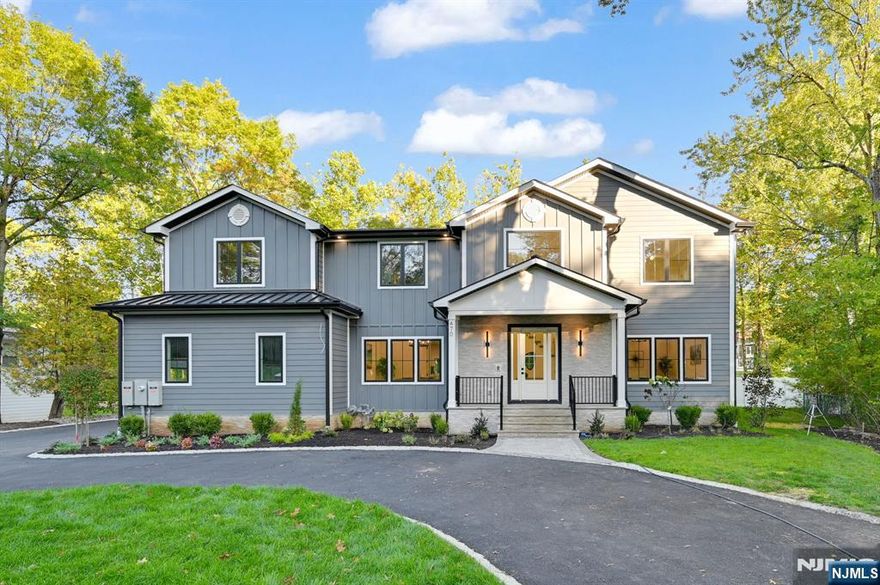 Stunning NEW CONSTRUCTION in the coveted Deerfield section, set on a flat, fully fenced 0.46-acre lot. Spanning approx. 7,500 sq ft inc garage across 3 finished levels, this home features 7 bedrooms, 6.5 baths, oversized 2-car garage & a circular driveway. A dramatic 2-story foyer opens to sun-filled interiors with 10â€™ ceilings on the first and second floors and 9â€™ ceilings in the finished basement.The family room w/ fireplace & built-in speakers flows seamlessly into a gourmet chefâ€™s kitchen w/ an oversized island, custom cabinetry & hood, Sub-Zero & Wolf appliances, double wall ovens, walk-in pantry, & breakfast nook. Formal living & dining rooms plus a sophisticated bar area create an ideal setting for entertaining, while a first-floor en-suite, mudroom, & powder room add everyday convenience.Upstairs, the primary suite offers dual walk-in closets & a spa-like bath w/ soaking tub, dual vanities & oversized shower. Four additional bedrooms include two en-suites w/ walk-in closets & two connected by a Jack-and-Jill bath, along w/ a full laundry room. The finished basement features a media room, recreation space w/ built-in speakers, office, fitness studio, guest suite, full bath & storage.Smart features include Nest thermostats, Ring doorbell, & EV charger, while a spacious patio overlooks the fenced backyard. Conveniently located near Gero Park, golf courses, town pool, top-rated schools, shopping, & NYC transit, and backed by a 10-year builder warranty.