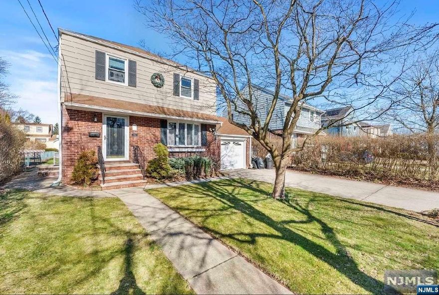 Welcome to this Colonial home in desirable section of town. The First floor features living room, dining room, renovated kitchen and half bath. Second floor features four bedrooms and full bath. Additional a very spacious Partially finished basement. Attached one car garage and a two car width driveway and more. This home also showcases a ample backyard. Don't wait Make this your home today !