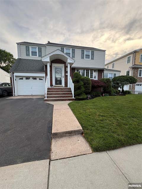 Photo of 80 Carlton AVE, East Rutherford, NJ 07073 (MLS # 26022060)