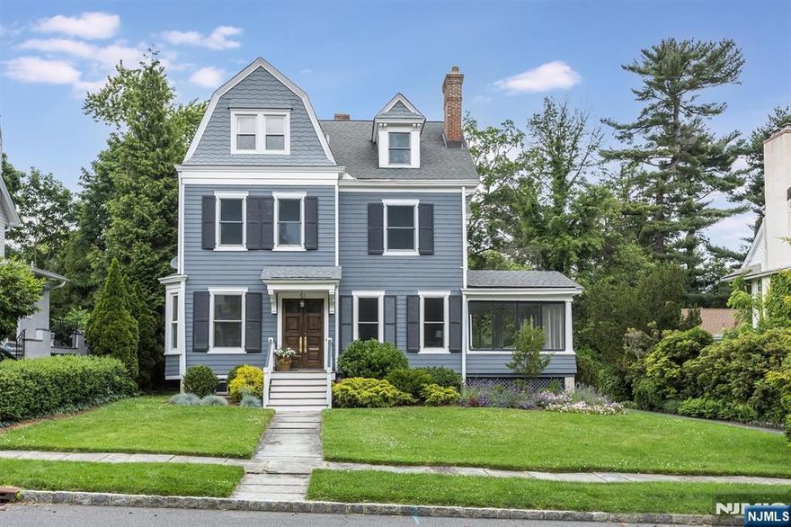 Welcome to this beautifully updated Victorian home, where classic elegance meets modern comfort! Situated on a quiet street in the desirable estate section this spacious 5BR, 3.5 bath home offers stunning architectural details, high end updates, and ample living space for today's lifestyle. Original woodwork, high ceilings, and intricate moldings are some of the first details you will notice. The heart of the home is the gourmet chef's kitchen, adjacent great room with radiant floor heating that overlooks a wraparound porch and manicured private garden. Two dedicated offices are perfect for WFH or creative spaces. The primary suite has radiant heating throughout, full closet room and spacious bath with a soaking tub. All BR's have updated custom closets. The basement is complete with a game room, gym space and quiet spa like room with custom built sauna. 2 car garage is adjacent to the home with EV charger.