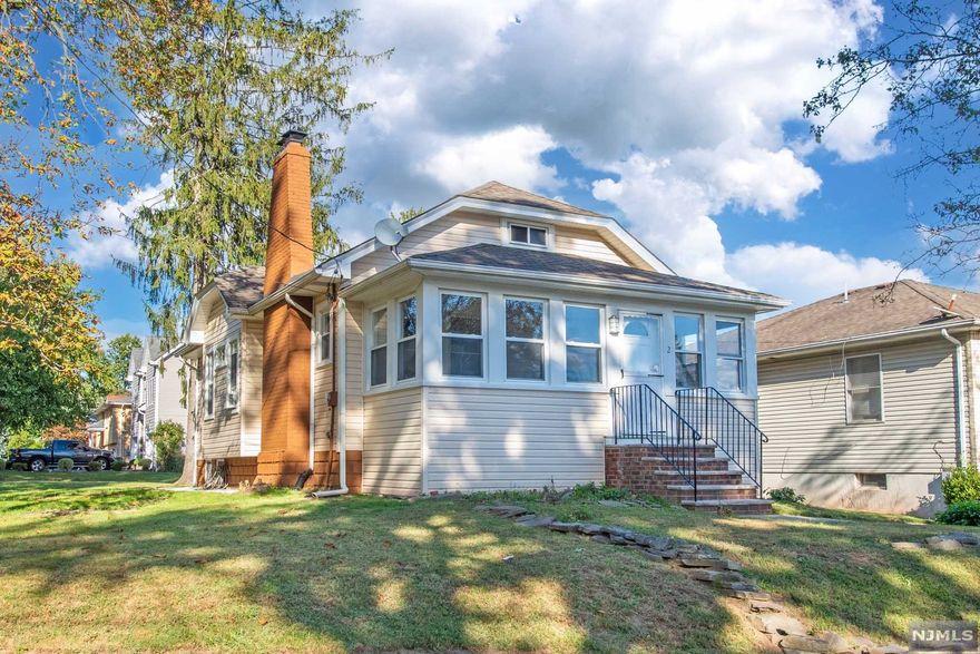 YOUR SEARCH ENDS HERE! Move right in! Perfect location and big property! Lovely ranch located on a beautiful quiet street. Cozy porch in front of house. Sparkling hardwood floors. Basement is very large spacious, ready to be finished! Also STAND UP ATTIC ready to be finished as another bedroom! Big backyard. COMMUTERS DREAM! House is rt off route 3, NYC bus comes just blocks away for commuters. House may belong to Nutley school system which is a huge plus!Kindly put 2 Orange St Nutley in GPS. Clifton/Nutley border.