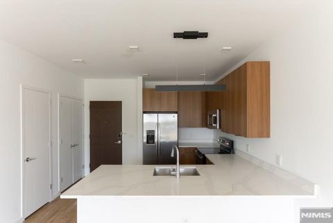 Photo of 300 State ST #303, Hackensack, NJ 07601 (MLS # 26015931)