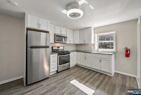 Photo of 386388 Main ST, Little Falls, NJ 07424 (MLS # 26021680)