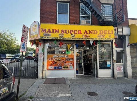 Photo of 394 Main Street, Paterson, NJ 07501 (MLS # 26028118)