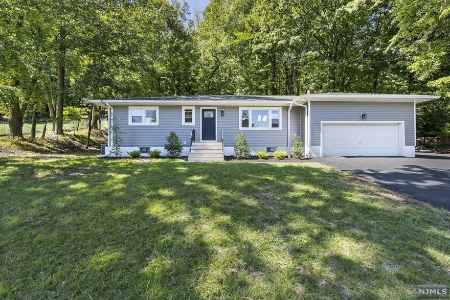 Your beautifully updated Ranch is waiting for you to call it home! Imagine coming home, appreciative of the freshly paved drive way, brand new siding, new roof, truly, a place that really feels like your new home. As you enter, allow yourself to fall in love with the idea of knowing that this is a home you can truly move in, kick your feet up and relax. An ample sized living room to enjoy quality time guests and with loved ones. Followed by the open chef's dream kitchen, perfect for cooking delicious meals. Plenty of natural lighting to uplift your homes frequency. 4 bed, 4 full bath all updated, including the master bed and bath. Finished basement waiting for your creativity with a full bathroom. Let's not forget about the fully updated mechanicals including electrical, plumbing, heating and Central A/C. Finally your backyard featuring the deck, perfect for entertaining. All that's left, is for you to bring it all to reality! So what are you waiting for? Book your showing today!