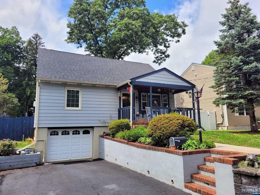 Welcome to this charming Cape Cod home nestled in a serene lake community! This delightful 4BR, 2 bath home offers a cozy & inviting atmosphere. As you step onto the front porch, you can envision enjoying your morning coffee while taking in the peaceful surroundings. You'll immediately appreciate the warm atmosphere created by the LR, w/HW floors and eat-in kitchen, complete w/new countertop, sink, & SS appliances. W/sliders leading to the deck, you can seamlessly extend your living space outdoors.The fenced-in backyard creates a private oasis, perfect for relaxation or entertaining guests, whether enjoying meals on the deck or patio, or cool nights around the fire pit. 2BRs and a full bath complete the 1st level. The upper level has an additional 2BR & full bath, ample closet space, including a cedar closet in the primary BR. The basement offers laundry, a potential rec area w/access to the attached garage providing convenient parking and storage options.