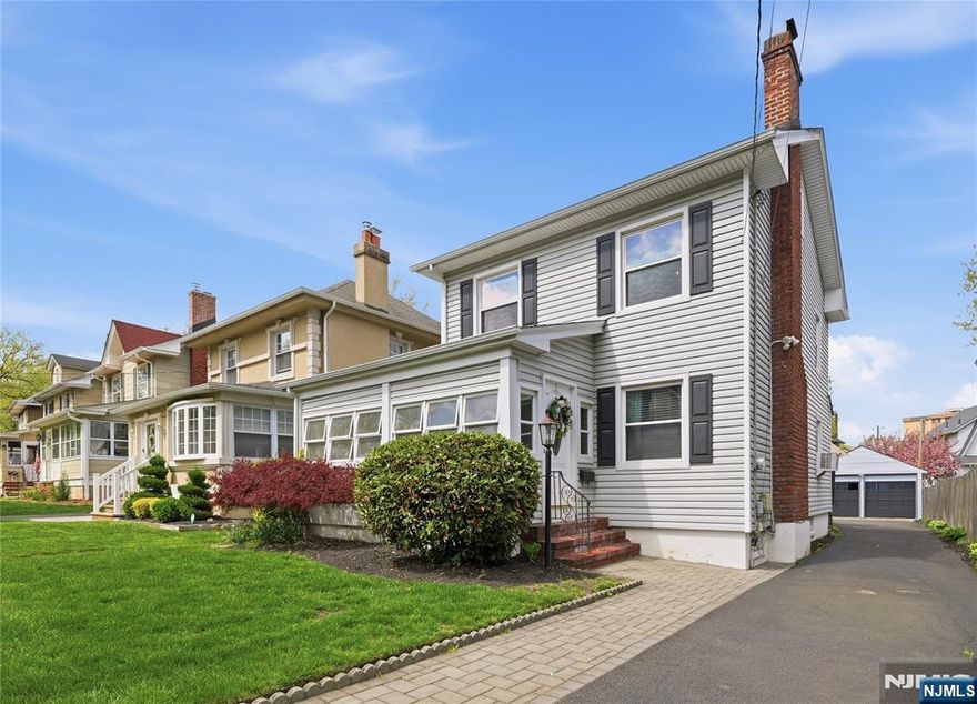 Set on a quiet, tree-lined street bordering Glen Ridge, this lovingly maintained Colonial offers three levels of living, plus an unfinished basement and two-car garage blending classic functionality and neighborly vibes. Enter from the sun-filled enclosed porch into a gracious living room with a gas fireplace and formal dining room. Chefs, prepare your meal in the updated kitchen featuring granite countertops, stainless steel appliances, and a center island designed for crafting recipes. The bonus room off the kitchen adds flexibility, with sliding doors opening to a two-tier deck and charming backyard, perfect for entertaining or relaxing. Complementing the backyard is a two-car garage located at the end of the driveway. The second floor features three bedrooms and a full bath, with stairs leading to a finished third level ideal as a primary suite with a walk-in closet and full bathroom. Additional space includes an unfinished basement with laundry, storage, and French drains plus sump pump. Blending suburban charm with city accessibility, this home is ideally located near major highways and two walkable train stations, offering access to NYC or Hoboken in less than 30 mins. or Downtown Montclair in 10 mins. 65 Carteret is positioned between Watsessing and Carteret Parks, and doors from local favorites like 23 Skiddoo, Jed's Bread, and Narda's. Your next chapter starts here. Property, fireplace, chimney, and flue conveyed as-is with no known issues.