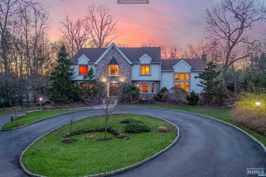 WELCOME TO THIS GRAND ESTATE NESTLED ON AN EXPANSIVE 1.69-ACRE LOT IN PRESTIGIOUS UPPER SADDLE RIVER. SET BACK FROM THE ROAD, A CIRCULAR DRIVEWAY LEADS YOU TO THE STATELY ENTRANCE. THE PROPERTY BOASTS A FULL-SIZED TENNIS CT, HEATED GUNITE POOL, & PATIO WITH PERGOLA. AN INVITING OASIS WITH COMPLETE PRIVACY FOR RELAXATION & GATHERINGS. UPON ENTERING THE HOME, YOU ARE GREETED BY A 2 STORY ENTRY, NATURAL LIGHT & A SEAMLESS FLOW THROUGHOUT THE LIVING SPACES. THE LIVING & DINING ROOMS FLANK THE 2-STORY ENTRY FOYER, GIVING WAY TO A LAVISH 2-STORY GREAT RM WITH FP. MODERN EAT IN KITCH W/ HIGH END APPLNCS, COFFEE BAR & MAGNIFICENT BFAST RM. AN IMPRESSIVE LIBRARY, PR, LAUNDRY, MUD RM COMPLETE THE 1ST FL. WITH 5 BRS & 4.5 BTHS, INCLUDING A SPACIOUS PRIMARY STE, THERE IS PRIVACY & COMFORT FOR ALL. THE FINISHED LOWER LEVEL FEATURES GRADE-LVL ACCESS WITH MULT SLIDERS, BONUS LIVING STE W/ DEN, BR & FBTH. SEP GYM W/VIEWS OF YARD. KOI POND, LUSH LANDSCAPING MAKE THIS A FANTASTIC RETREAT.