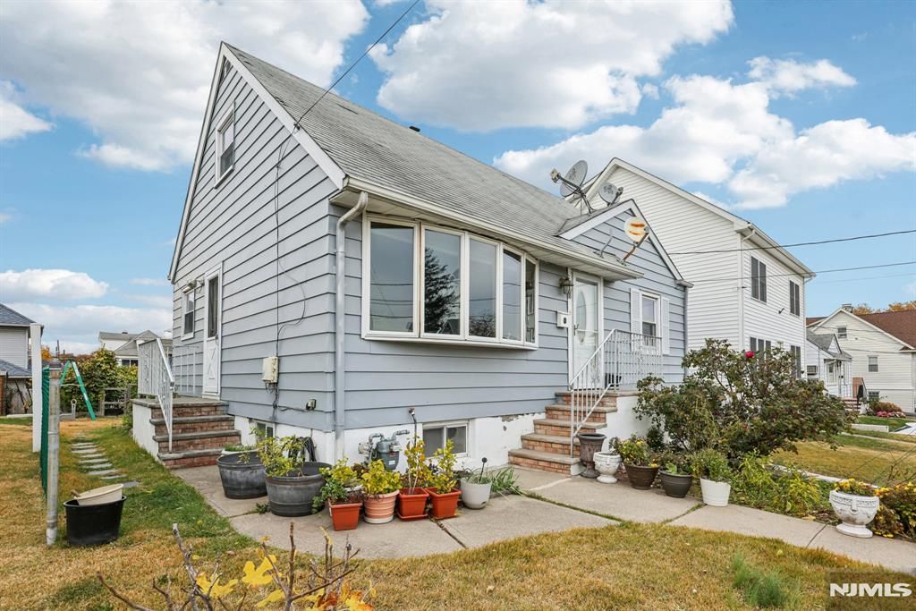 Photo of 18 Scher Place, Passaic, NJ 07055 (MLS # 25042165)