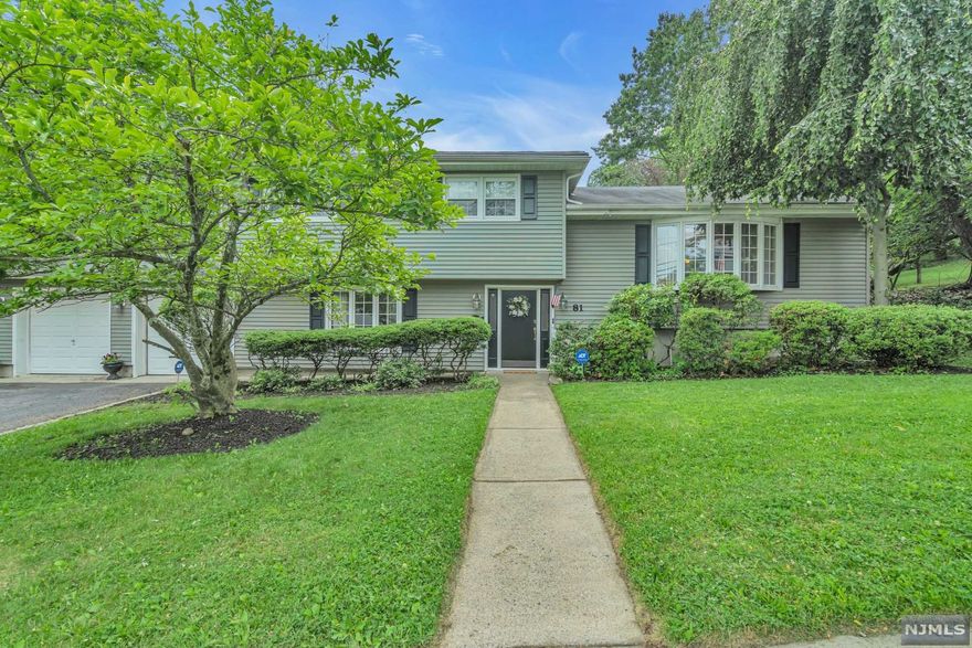 Welcome to this gorgeous open concept 3 bedroom 2.5 bath split in the Valley Section of Wayne. Featuring hardwood floors, updated & expanded eat-in kitchen w/breakfast bar, granite counter tops, stainless steel kitchen aide appliances, formal dining room & spacious living room. The primary bedroom includes a walk-in closet, hardwood floors and a full bathroom, this level also includes an updated full main bathroom, 2 more bedrooms both featuring custom closets & hardwood floors. The lower level has a generous size family room with a gas fireplace, powder room and access to the backyard oasis. Other features include an extra large deck accessed from sliding doors off the dining room, beautiful inground pool, 2 car garage, all on an extra large lot of .45 acres. New furnace and air conditioning and newer hot water heater. Enjoy the Wayne lifestyle & participate in all the town has to offer while still being close to shopping, schools, highways & NYC transportation.