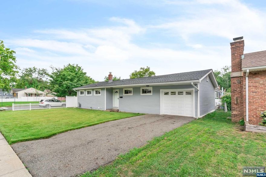 WOW- a move-in ready gem that combines modern updates with classic charm. This beautifully renovated home features a new kitchen and bathroom and much more. Situated on a desirable corner lot on a quite street this is what you've been looking for. Additional features include an attached garage, driveway & central air and so much more. Come turn this house into a home before someone else does!