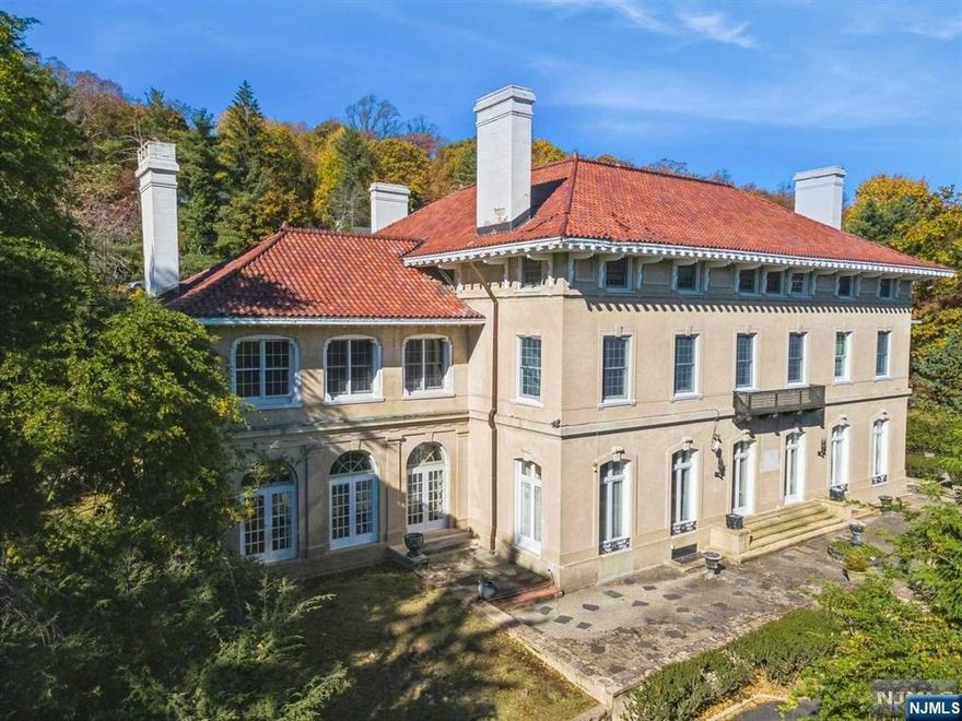 1913 Renaissance Revival estate locateed in the highly sought-after Estate Section is nestled on approxi. 1.5 acres, currently subdivided into 3 parcels, the property boasts multiple terraces, a built-in pool, a sport court, & an integrated 2-car garage. This grand residence, offered as-is & awaiting your creative touch, boasts breathtaking original details & unparalleled character. Step into a spectacular foyer that sets an elegant tone with soaring ceilings & a majestic split staircase. The 1st floor showcases grand-sized rooms designed for both entertaining & relaxation. A formal library with built-in bookcases invites quiet moments, while the banquet-sized DR captivates with its exquisite wood paneling, pocket doors, & intricate decorative ceiling. The expansive LR flows seamlessly into a charming solarium, highlighted by a classic black-and-white tiled floor & an impressive eight sets of French doors that flood the space with natural light.