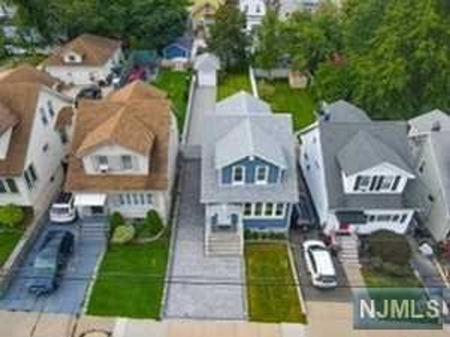 TOTALLY GUT RENOVATED 3 BEDROOMS, 3 BATHS, 1 CAR GARAGE BEAUTY READY TO BE CALLED HOME! APROX 2,100 SF OF LIVING SPACE METICULOUSLY UPDATED IN 2021 FEATURES HW FLOORS, NEW KITCHEN AND BATHS, SIDING, ROOF, WINDOWS, PAVERS AND UPDATED MECHANICALS. BRAND NEW FINISHED BASEMENT WITH FULL BATH AND SEPARATE ENTRANCE. HUGE FENCED IN YARD AND GARGAE PERFECT FOR ENTERTAINING! NOTHING TO DO BUT BRING YOUR TOOTH BRUSH! DRIVEWAY FOR 8+ CARS/CENTRAL AIR CONDITION! SUPER LOW TAXES!!! CLOSE TO TRAIN/BUS/SCHOOLS/SHOPPING.