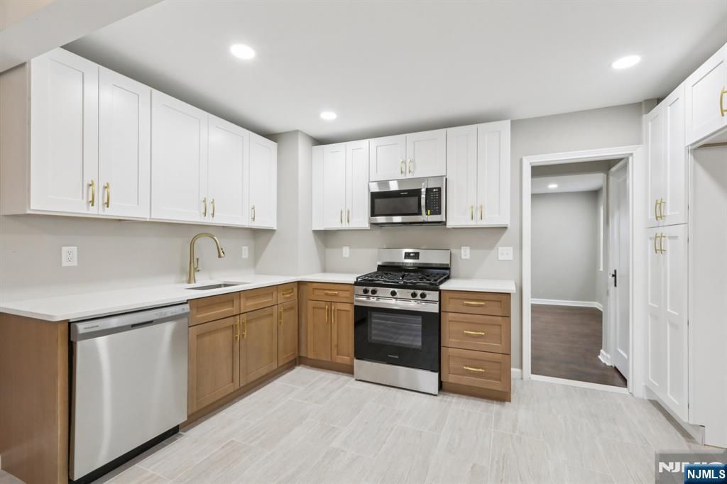 Photo of 64 Surrey Lane, Clifton, NJ 07012 (MLS # 26000403)