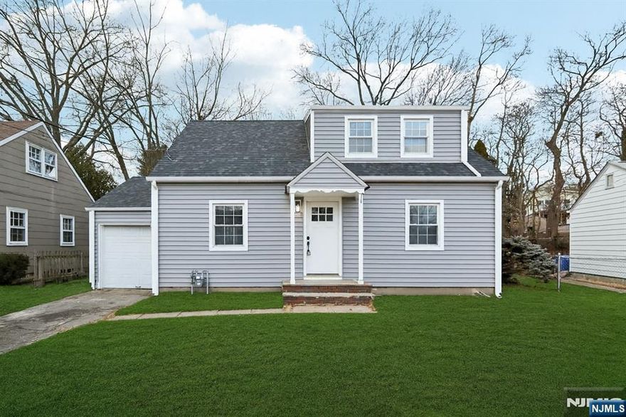 Completely renovated 4 bedroom, 2 bath Cape offering a perfect blend of charm and modern style. This move-in-ready home features a bright, open layout, a brand-new eat in kitchen with sleek cabinetry, quartz countertops, and stainless steel appliances, plus two beautifully updated full baths. Flexible living space includes generously sized bedrooms and the option for a first-floor bedroom or home office. Additional highlights include newly finished hardwood flooring, high hats, fresh paint throughout, and a 1 car garage. Extra large back yard for entertaining. Just unpack and enjoy. *Some photos virtually staged*