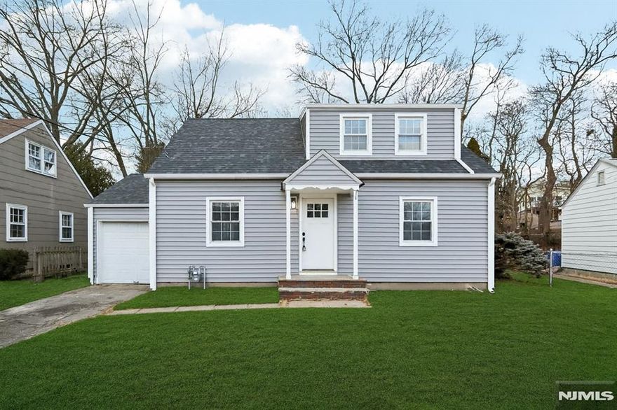 Completely renovated 4 bedroom, 2 bath Cape offering a perfect blend of charm and modern style. This move-in-ready home features a bright, open layout, a brand-new eat in kitchen with sleek cabinetry, quartz countertops, and stainless steel appliances, plus two beautifully updated full baths. Flexible living space includes generously sized bedrooms and the option for a first-floor bedroom or home office. Additional highlights include newly finished hardwood flooring, high hats, fresh paint throughout, and a 1 car garage. Extra large back yard for entertaining. Just unpack and enjoy. *Some photos virtually staged*