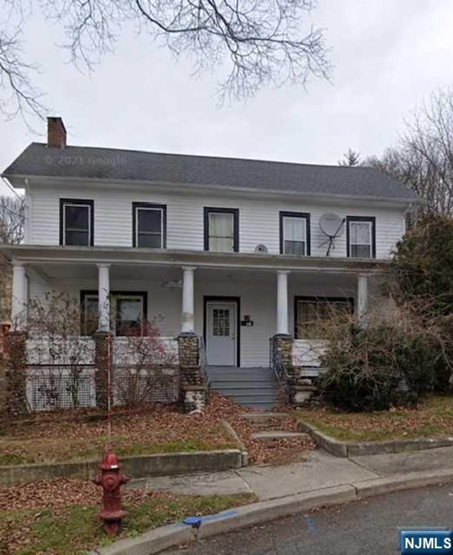 INVESTOR SPECIAL! 4-family value add. Three units are vacant and ready for finishes to bring in market rent. House is heated by overground oil that has been updated in the last ten years. Three units in the main house and one over the garage. Large property with the possibility of a subdivision to build an additional multi-family. This is a true value add. Large chain supermarket being built within proximity of the property. You don't want to miss this opportunity.