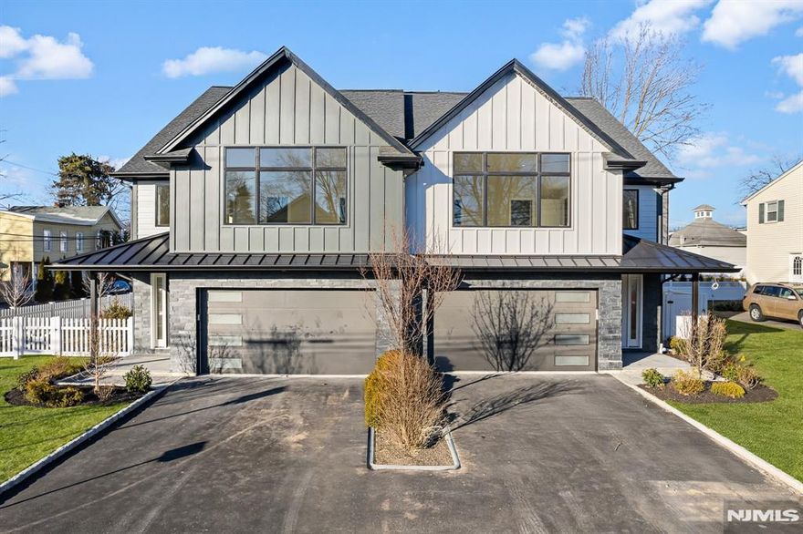 New construction luxury townhome in the heart of Ramsey. Experience a new age lifestyle with unmatched convenience. Fantastic location steps away from train station and walking distance to downtown Ramsey with amazing stores and restaurants! Home features 4 bedrooms, 3 full bathrooms, 1 half bath. Unit is +/- 2,950 sqft of living space & a 2 car garage with EV prewired. Engineered white oak floors throughout. 3 levels of living space. First floor features a modern kitchen with 8-foot quartz waterfall island, quartz backsplash, Bosch stainless steel appliances, and modern cabinetry. Large 8ft sliding door onto rear patio. Open floor concept provides an ideal space for entertaining. Bedrooms on second level with Primary Suite with en-suite bathroom & WIC finished with shelving, 2 extra bedrooms with hallway full bathroom and laundry closet. 3rd floor consists of a loft style bedroom/ office/ playroom will high ceilings and a full bathroom. Stone and Hardi-Plank siding.