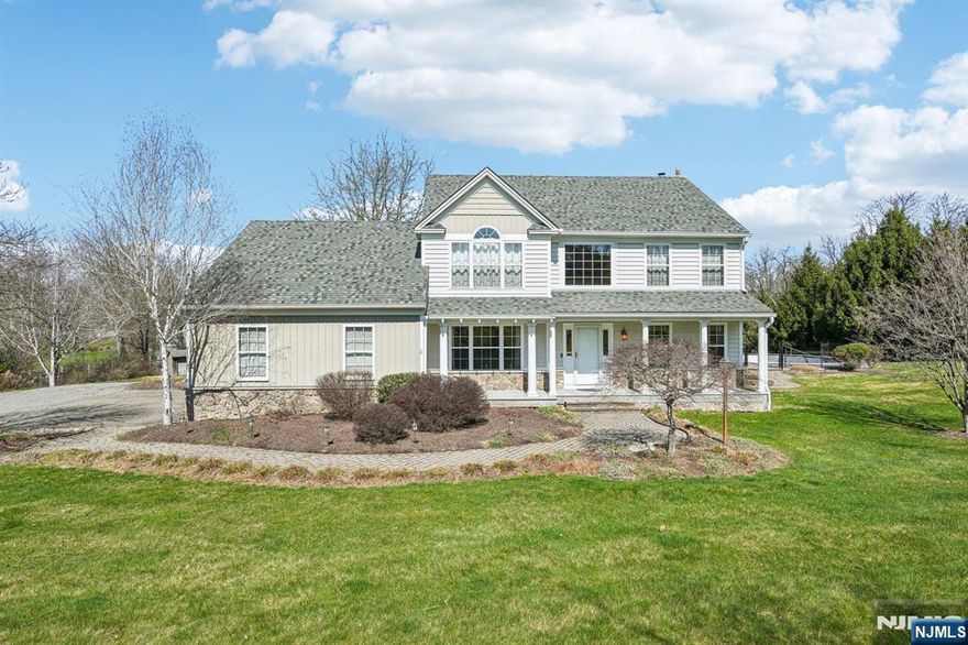 This is a beautiful colonial style home sitting on 2+ acres of land. The backyard is an oasis that includes a large paver patio and separate pool area. The home's first floor has an executive office, large living room with gas fireplace, formal dining room, large renovated kitchen with center island and dining area, powder room, laundry room and mud room with rear exterior entrance finish off the first floor. The second floor has a master suite that includes a master bath with jetted tub, shower stall, walk-in closet that is almost 100 SF, and an unfinished area beyond the walk-in closet that is ready for you to finish as a another WIC, dressing area or sitting area. The second floor has three large sized bedrooms, and a hall bath. The property has been professionally landscaped and maintained, and is perfect for entertaining.