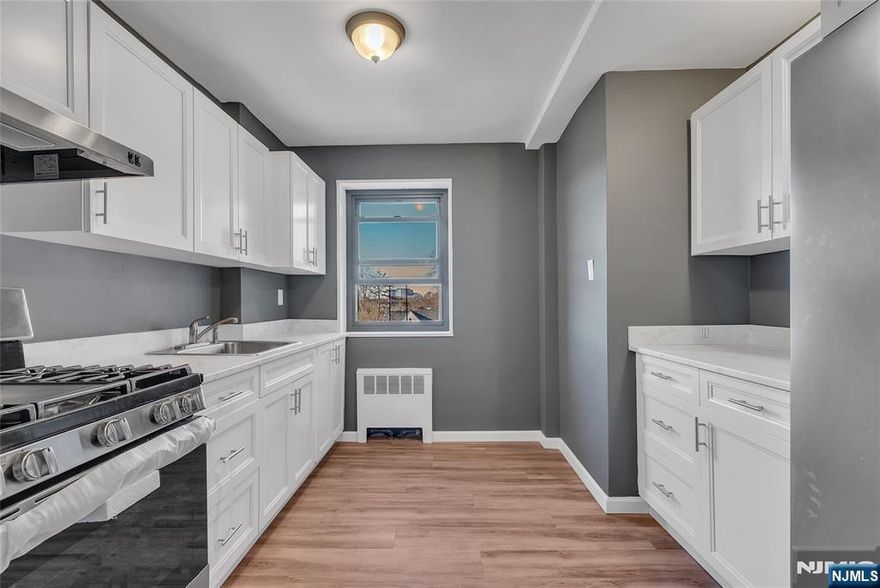 Large 1 bedroom condo! Modern kitchen equipped with brand-new appliances, new floors, and plenty of closet space are some of the perks of this great unit! Enjoy building amenities including elevators, an in-ground pool, laundry facilities, an event/conference room, and one covered assigned parking space. Conveniently located 2 blocks away from the train station, major transportation routes to NYC (which is only 20 minutes away), near schools, and shopping, making this an ideal place to call home or a smart investment opportunity.