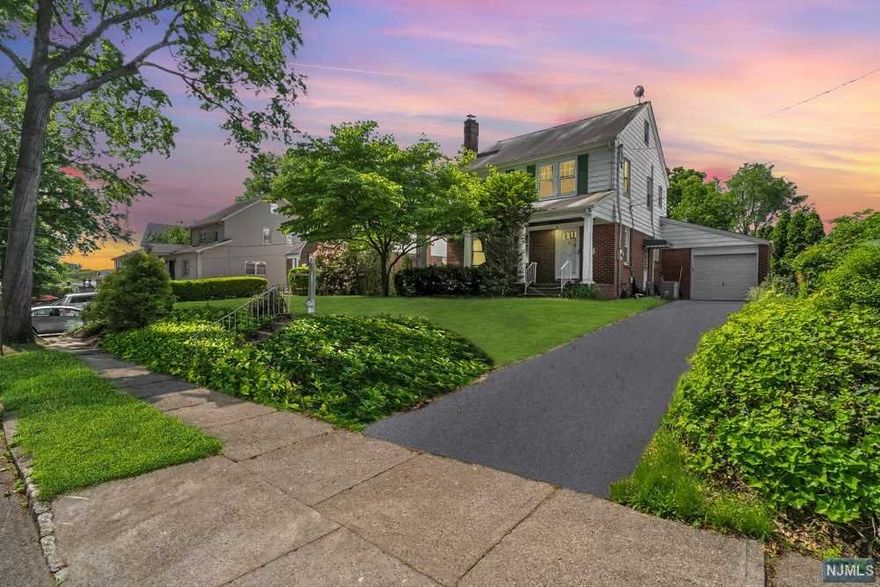 A MUST-SEE! This charming brick-faced colonial is steps from the center of Nutley. Up to the home's entrance, you are greeted by an inviting lemonade porch. The 1st floor has a light-filled formal LR w/ wood burning FPL, large formal DR and EIK. Off the kitchen you'll find a convenient 1/2 bath, interior access to the one car garage and a versatile family room, which can be utilized as an office or even a guest room. The 2nd level offers 3 generously sized BRs with ample closets and full bath. Through the 3rd BR there's access to the walk-up attic, which offers a sizable storage area that may be expanded. The unfinished basement has much potential and includes a 1/2 bath. The fenced-in backyard offers privacy plus a desirable in-ground pool. This home has newer mechanicals and central A/C. The home is both turnkey and a blank canvas to update to your design preferences. With an amazing location and spaces to accommodate many different lifestyles, this opportunity WILL NOT LAST!