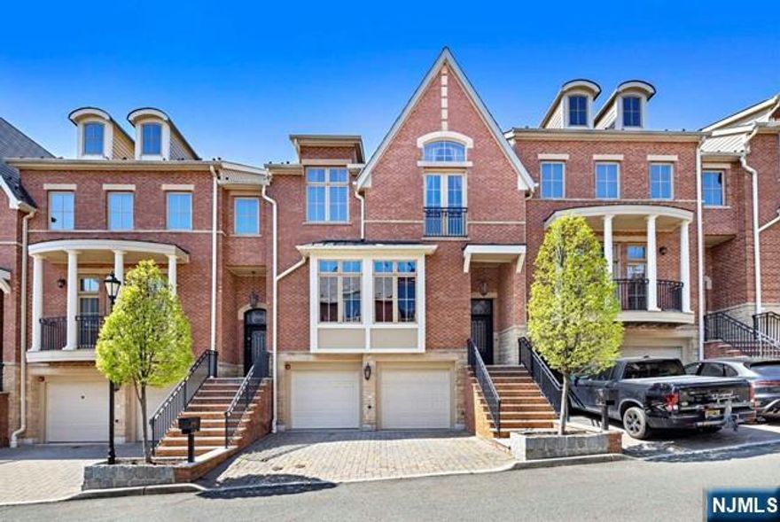 Immaculate, bright townhouse located in one of the most luxury and upscale communities along the Gold Coast with stunning Hudson River and NYC views from all 3 levels. 1st floor featuring LR with 9 ft vaulted ceilings and huge windows, custom family room with built in TV, powder room. Kitchen with central island, granite countertops and stainless steel appliances opened to the DR with exit to the terrace. 2nd floor featuring primary BR suite with 20 ft vaulted ceiling, primary BTH with Jacuzzi tab, huge WIC and French doors to the balcony. 2 more BRS and full BTH on the top floor. An elevator will take you down to the ground floor family/media room, BR/BTH and exit to the patio. Soaring ceilings, crown and floor moldings, hardwood floors, high efficiency windows throughout the unit, 2 car heated garage with custom flooring. Heating system upgraded in 2021, CAC in 2019. Close to shops, restaurants and schools. Convenient commute to NYC by bus and ferry. LB is related to LLC manager.