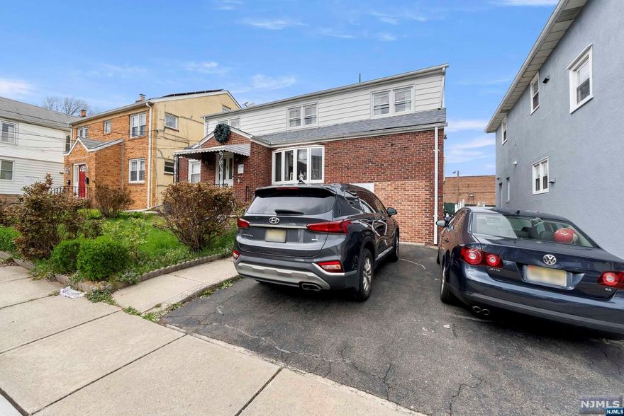 Here is your chance to own a 2-Family in Nutley. Looks can be deceiving, both units are spacious & both units have own en-suite. Unit 1 features large kitchen with wood burning fireplace, living room, 4 total bedrooms, 3 full baths and finished basement. Unit 2 features eat in kitchen, 2 spacious bedrooms and living room. Low maintenance yard will make it a joy for outdoor entertaining and enjoying the beautiful weather. Close to major highways, schools, restaurants AND MORE!